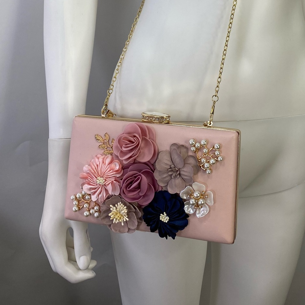 Pink clutch bag with flowers